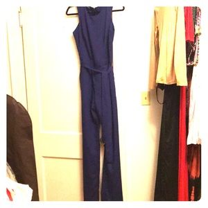 Bebe navy jumpsuit with back cut outs